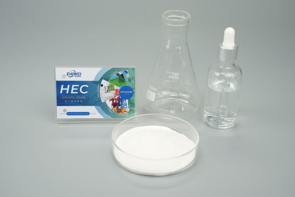 HEC powder sample with product packaging and lab glassware.