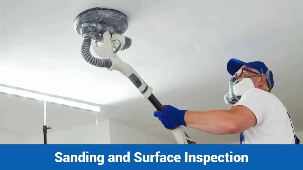Inspection of a sanded wall putty surface under raking light before painting.